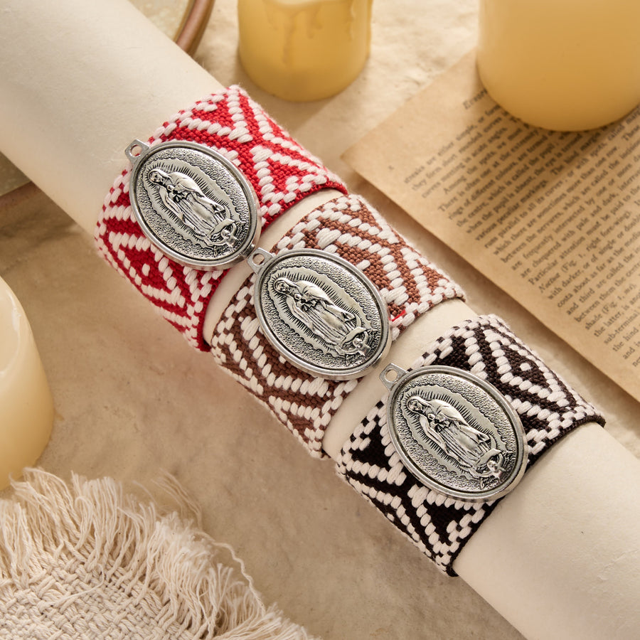 Vintage Embossed Oval Our Lady Charm Woven Tassel End Wrap Bracelet: A Reminder of Motherly Blessing