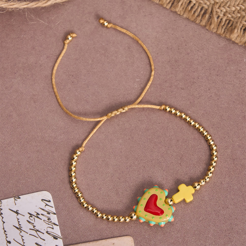 Cartoon Style Hand-Decorated Sacred Heart & Tiny Cross Accent Gold Bead Adjustable Cord Bracelet