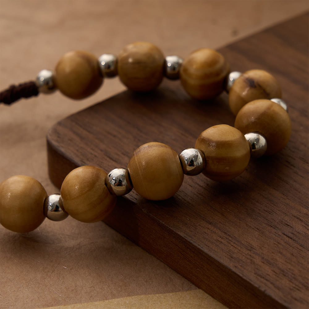 Cord Wood Crucifix Rosary Bracelet: Graceful Token of Quiet Prayerful Peace