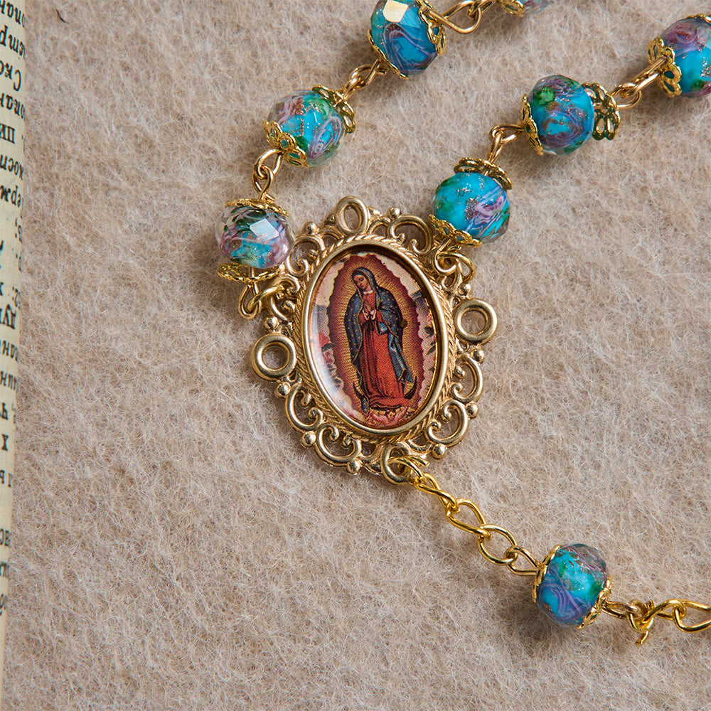 Blue Floral Glass Rosary With Rose Gilded Crucifix & Our Lady of Guadalupe Medallion