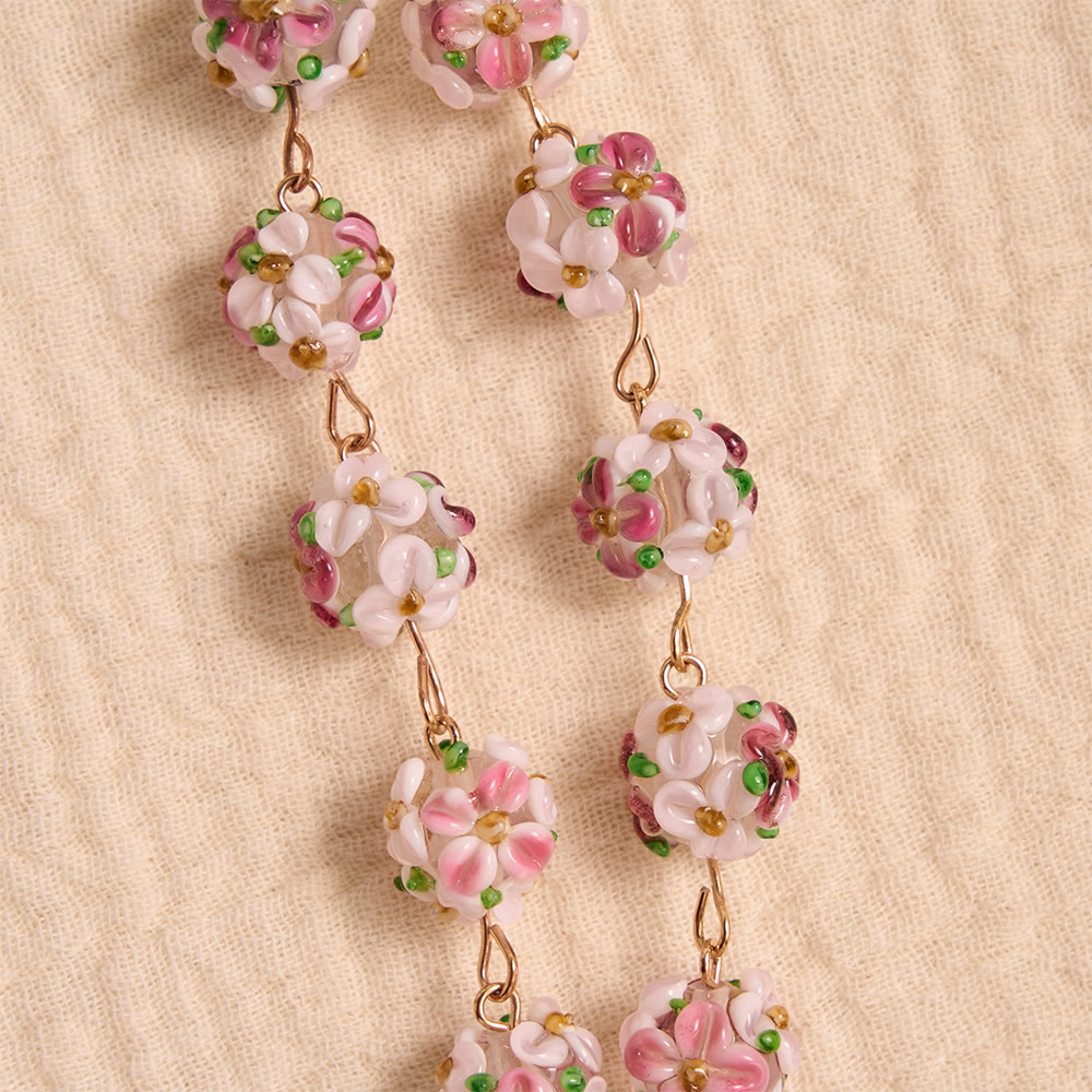 Ornate Jeweled Gold Cross Floral Glass Car Rosary: Token of Heavenly Travel Protection