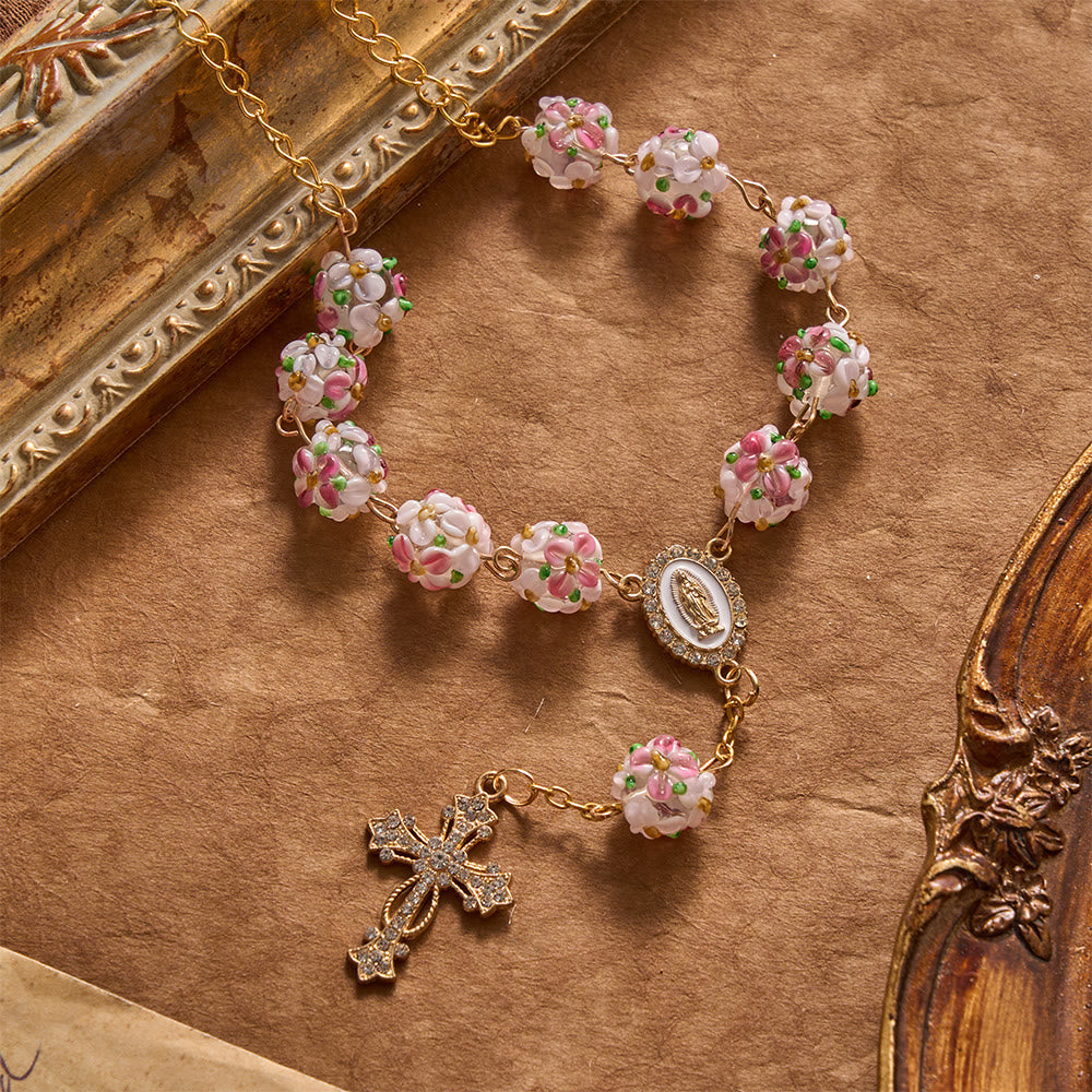 Ornate Jeweled Gold Cross Floral Glass Car Rosary: Token of Heavenly Travel Protection
