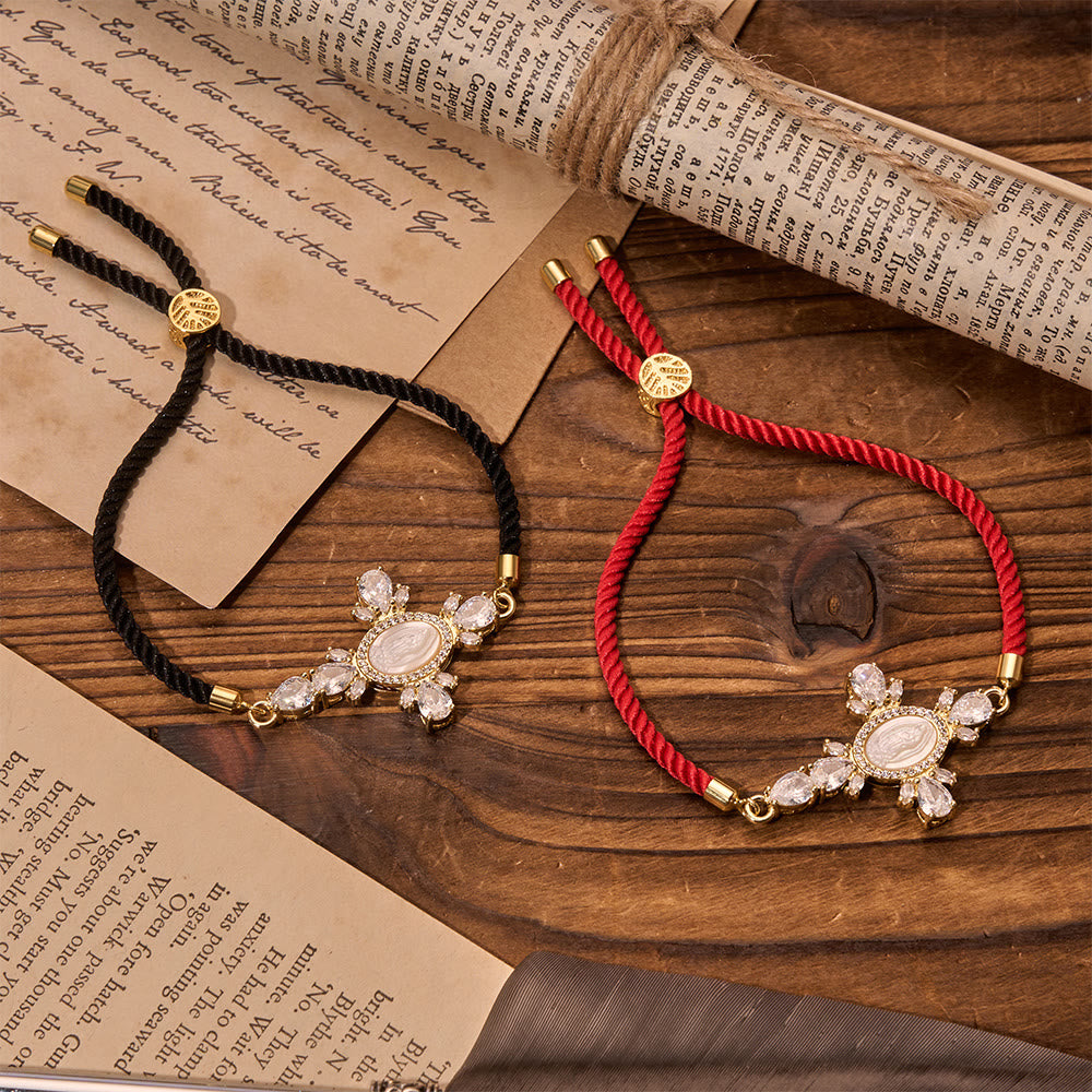 Braided Cord Bracelet With Virgin Mary Portrait Jeweled Cross: Emblem of Motherly Heavenly Mercy