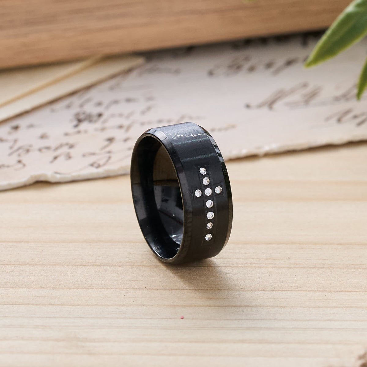 Sleek Wide Band Jeweled Cross Ring: Token of Calming Divine Guidance