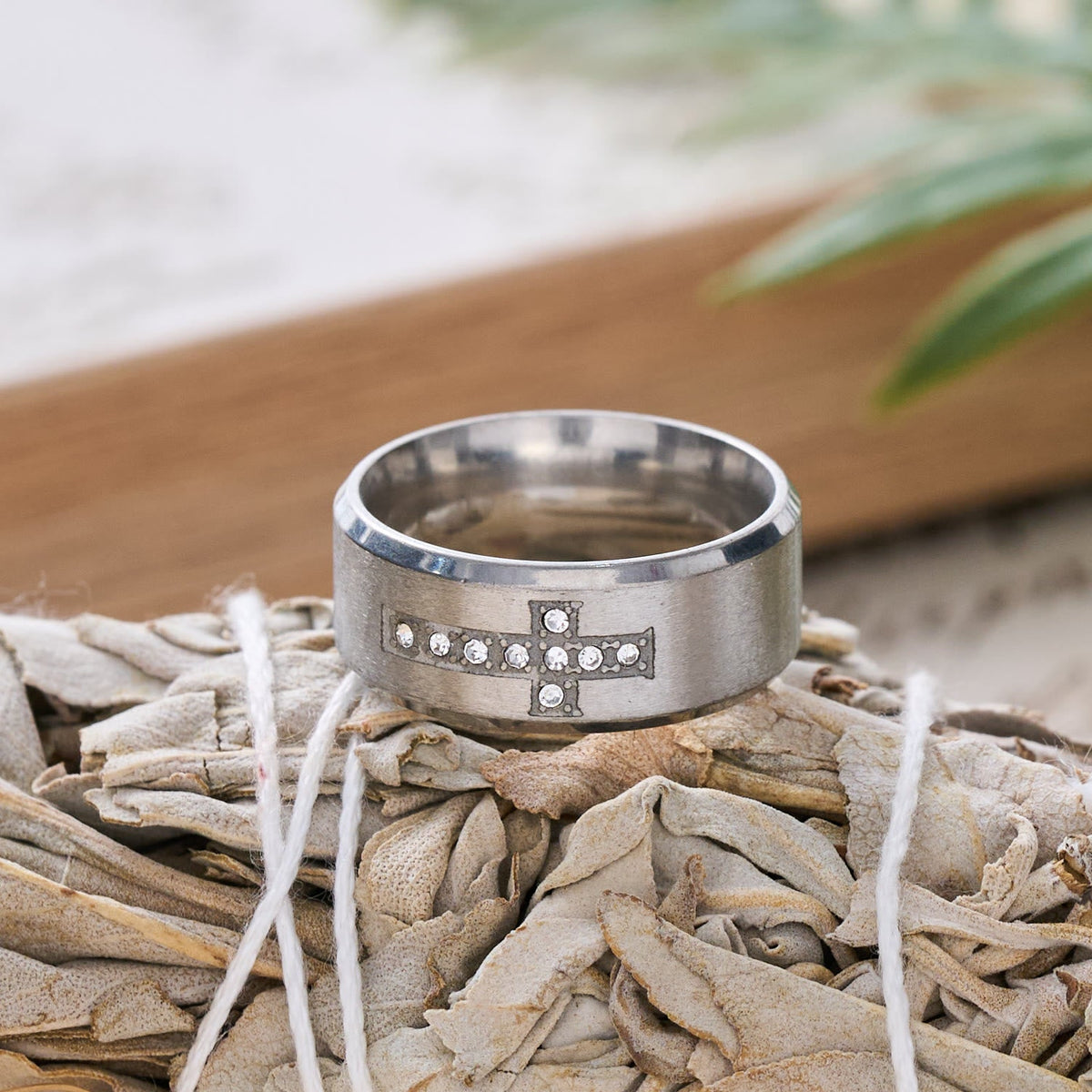 Sleek Wide Band Jeweled Cross Ring: Token of Calming Divine Guidance