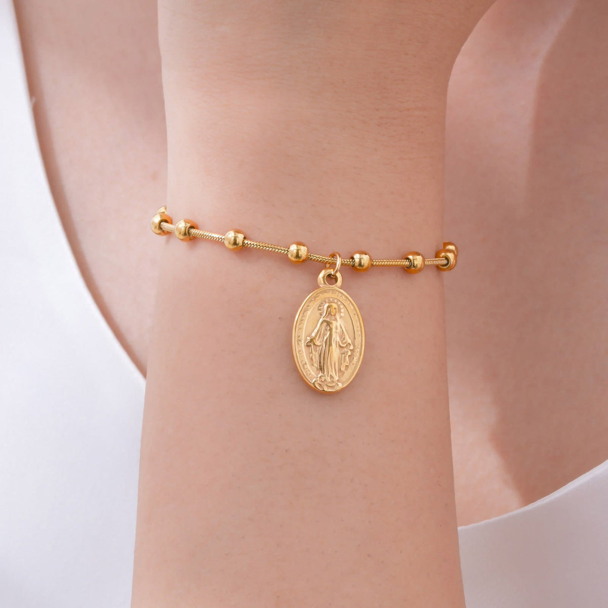 Textured Bead‑Chain Medal Bracelet: Token of Sustained Inner Fortitude