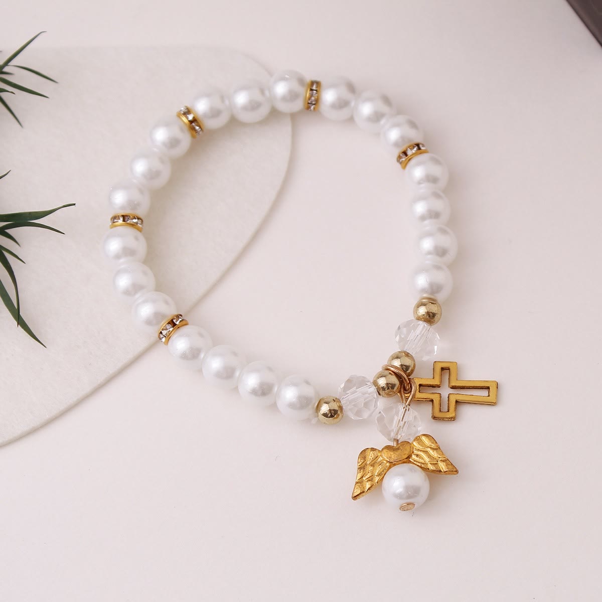 Lustrous Pearl Beaded Cross Stretch Bracelet: Emblem of Pure Heavenly Purity