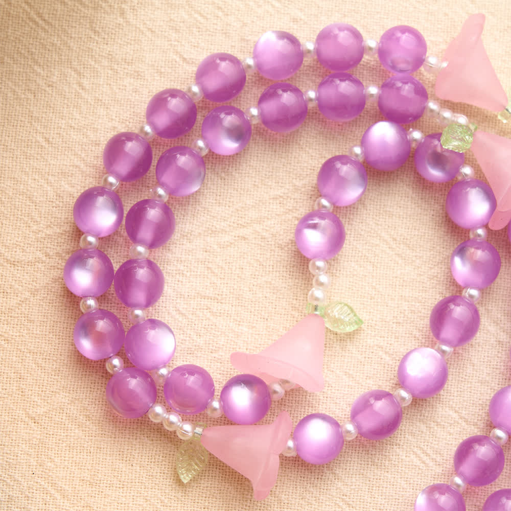 Luminous Resin Cat‑Eye Bead Rosary With Delicate Lily Accents: Emblem of Gentle Heavenly Solace