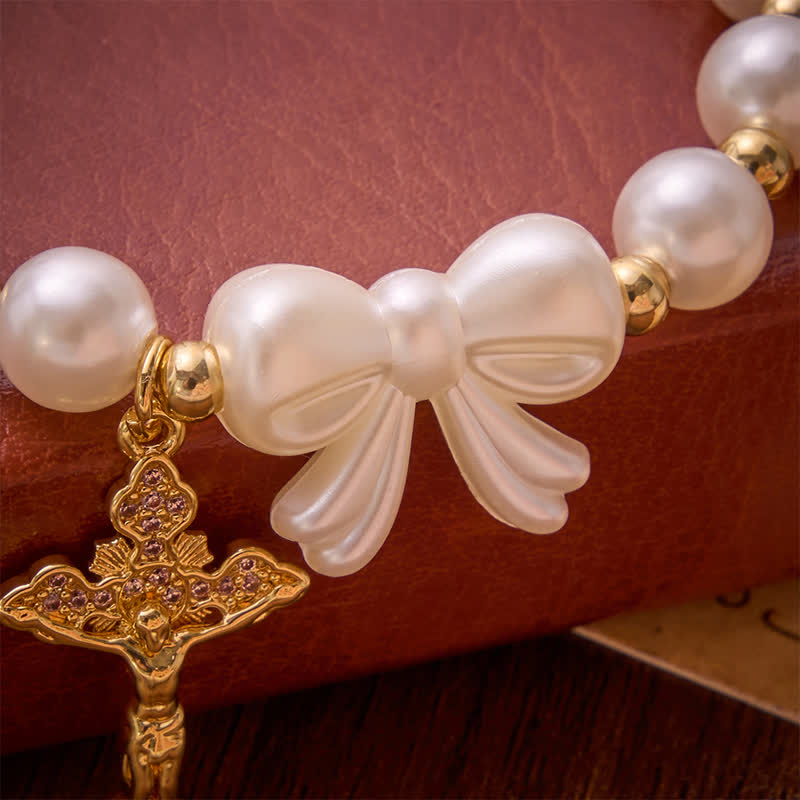 White Beaded Bow Rosary Bracelet With Jeweled Crucifix: Emblem of Sweet Heavenly Grace