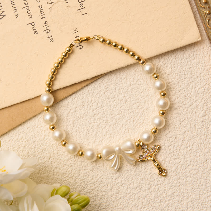 White Beaded Bow Rosary Bracelet With Jeweled Crucifix: Emblem of Sweet Heavenly Grace