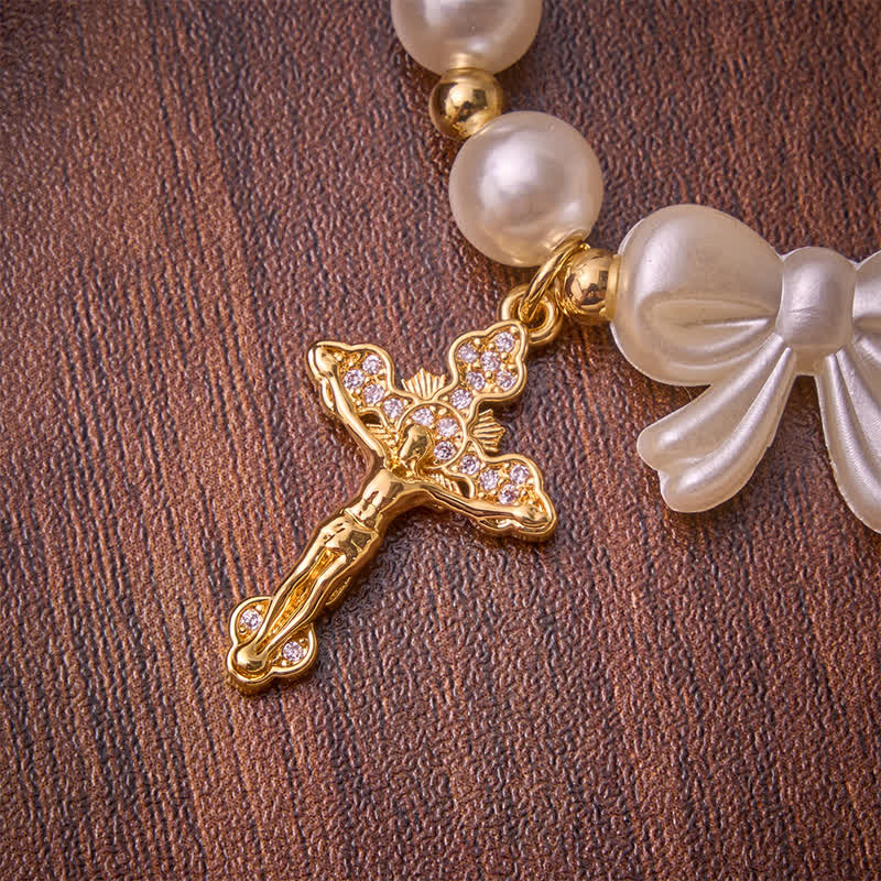 White Beaded Bow Rosary Bracelet With Jeweled Crucifix: Emblem of Sweet Heavenly Grace