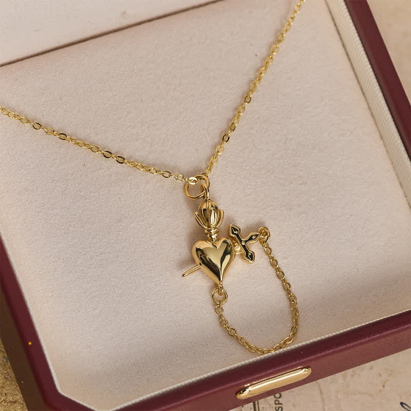 Sculpted Sacred Heart With Dagger Necklace: Symbol Of Calm Everlasting Peace