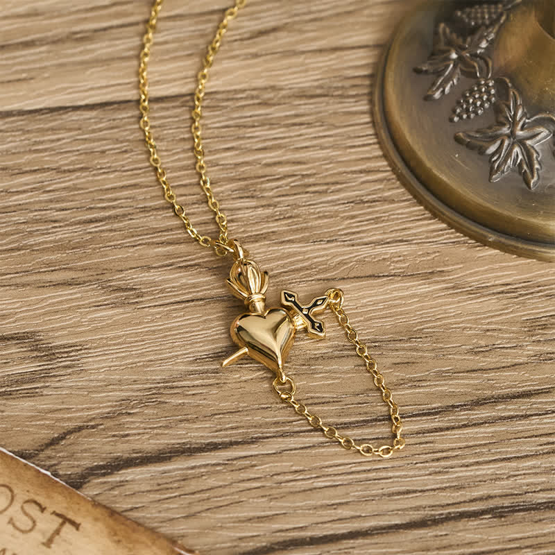 Sculpted Sacred Heart With Dagger Necklace: Symbol Of Calm Everlasting Peace