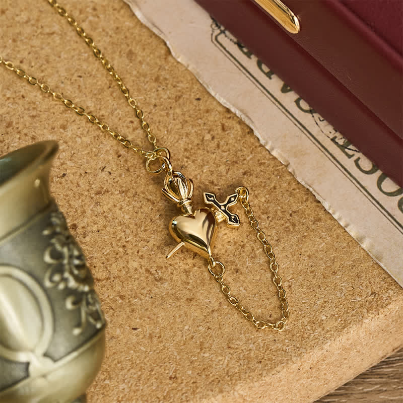 Sculpted Sacred Heart With Dagger Necklace: Symbol Of Calm Everlasting Peace