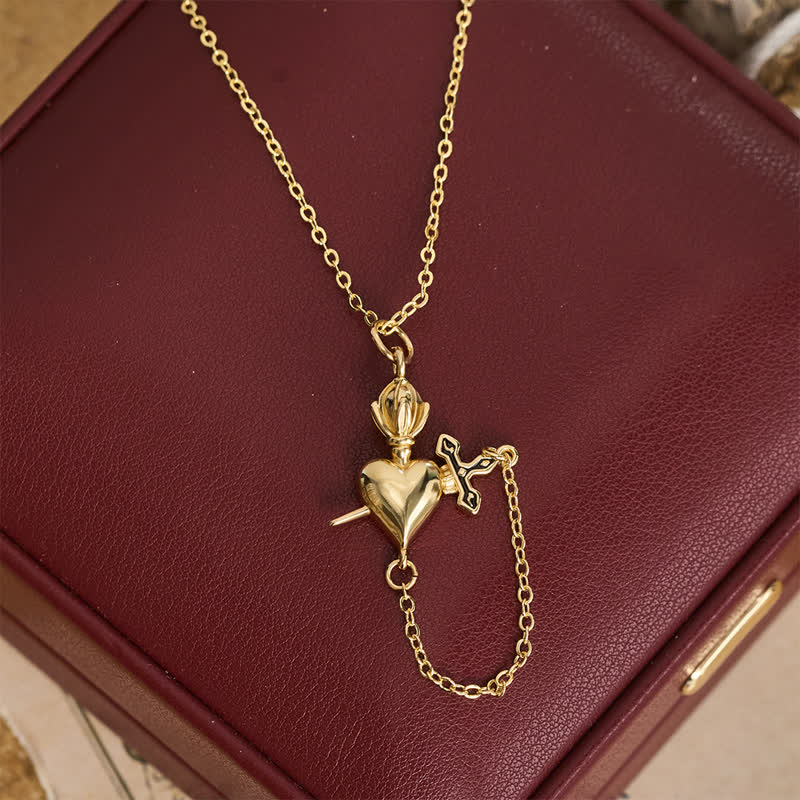 Sculpted Sacred Heart With Dagger Necklace: Symbol Of Calm Everlasting Peace