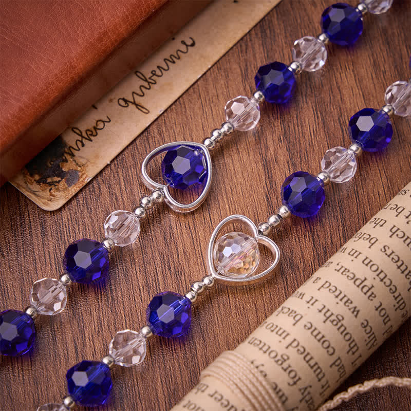 Hollow Heart Glass Rosary with Deep Blue Faceted Beads: Token of Abiding Divine Protection