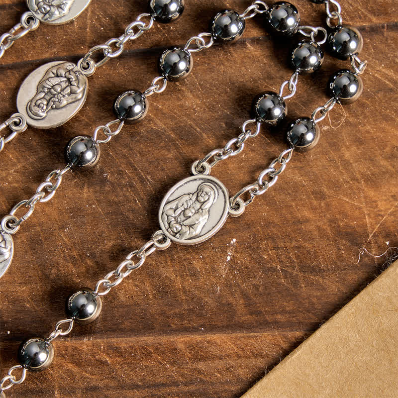 Our Lady of Sorrows Hematite Rosary Set: Emblem of Soft Heavenly Blessing