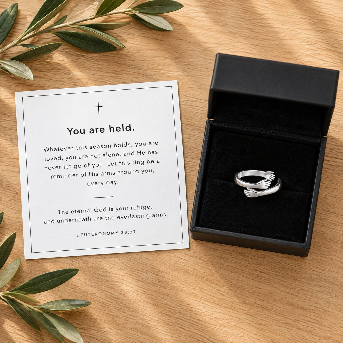 Gift box with the "You are held." Deuteronomy 33:27 verse card