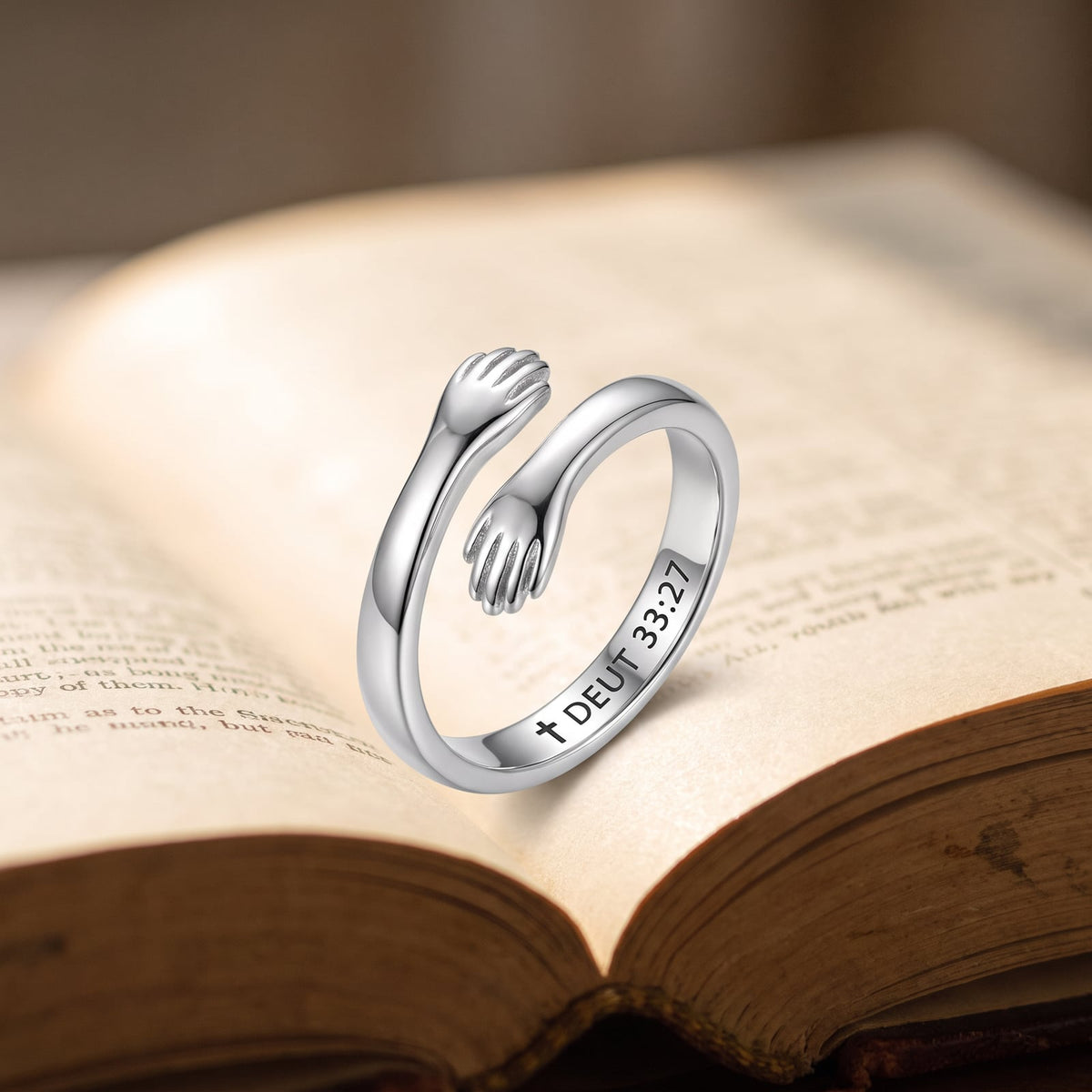 Engraved inside the band: ✝ DEUT 33:27