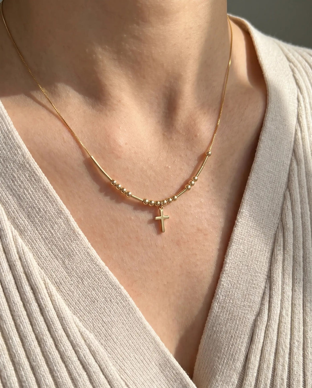 Hidden Prayer Morse Code Necklace in gold, worn