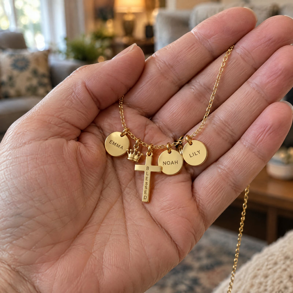 Name discs engraved EMMA, NOAH and LILY with the BLESSED cross